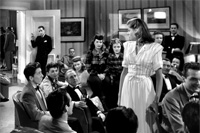 Humphrey Bogart ako Philip Marlow a Lauren Bacall ako Vivian v detektívke Hlboký spánok